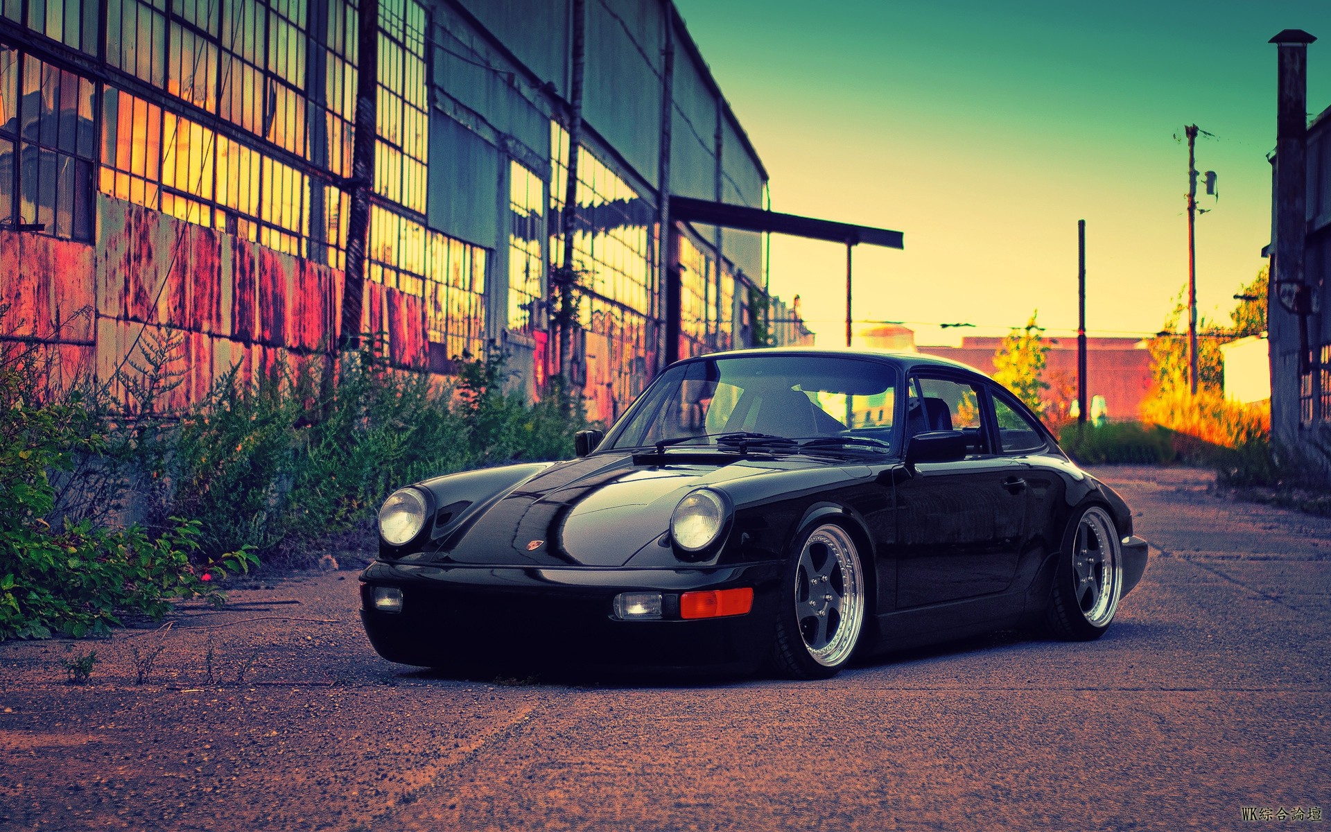 porsche_black_building_95163_1920x1200.jpg